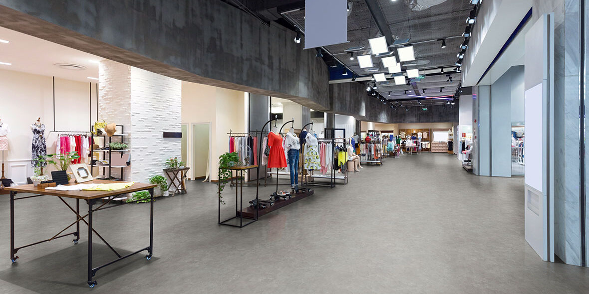 mannequins in fashion shop display window