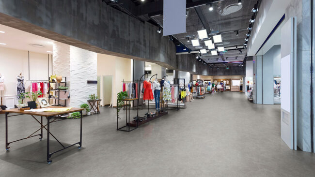 mannequins in fashion shop display window